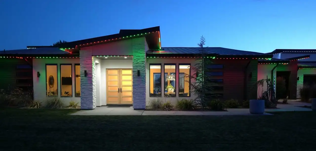 New brick home with permanent track lighting installed